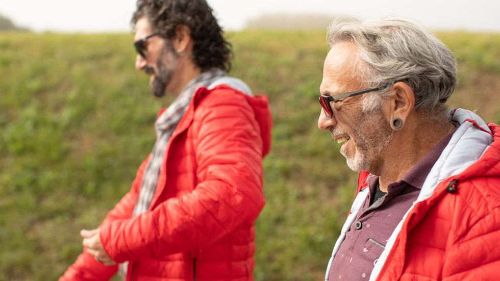 Older man living with HIV feeling happy and healthy