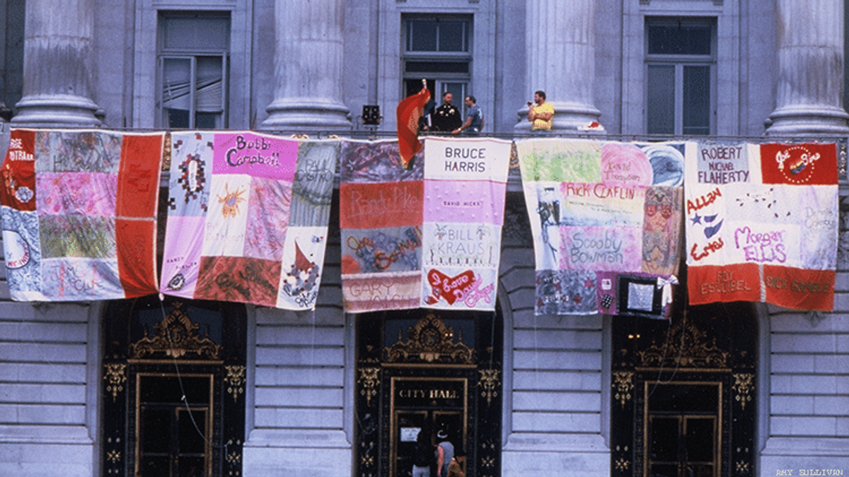 Original panels of the AIDS Memorial Quilt on display from the mayor's balcony at San Francisco's city hall in 1987