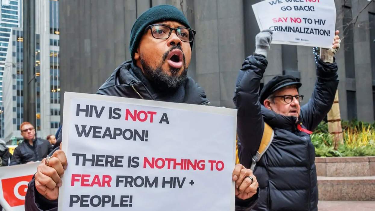 Racial justice leader Robert Suttle protests HIV criminalization.