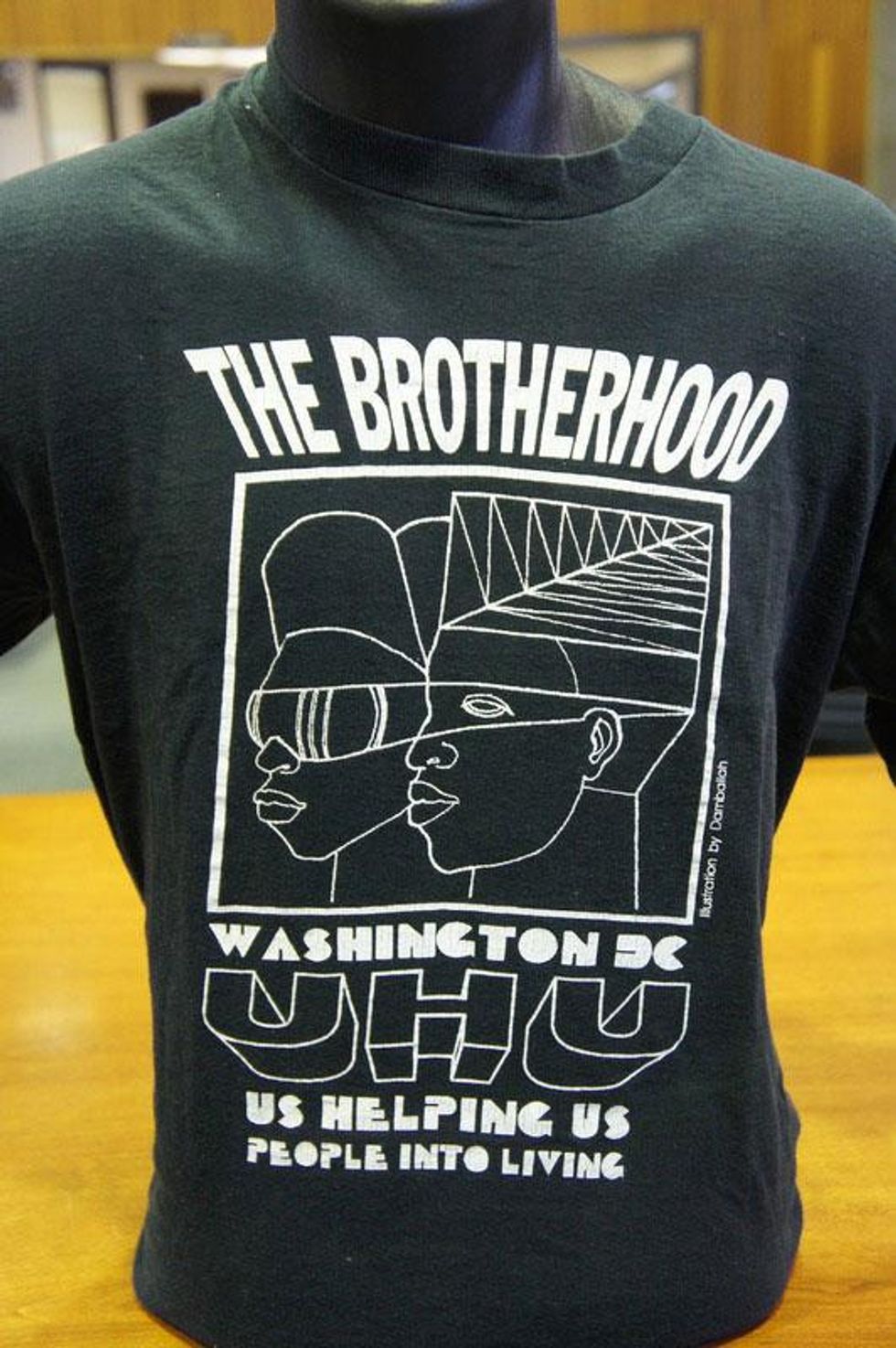 Us Helping Us Black T-Shirts