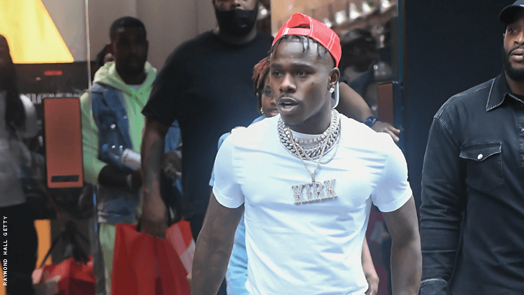 DaBaby with a group leaving a store