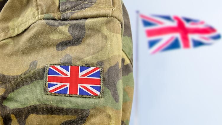 British military member with flag